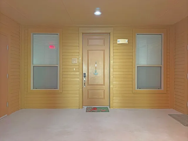 an empty room with windows