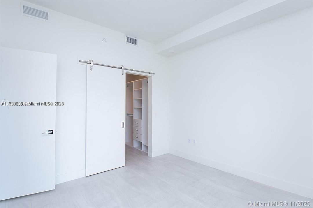 2000 Metropica Way, Unit 614 Sunrise, FL 33323 - Photo 10 of 18 a view of an empty room