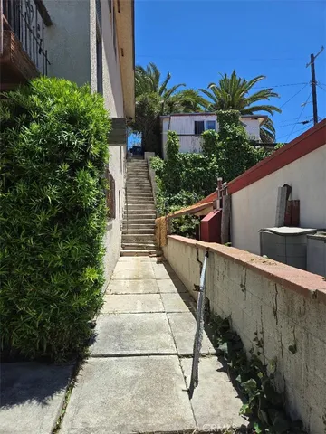 a view of balcony with furniture