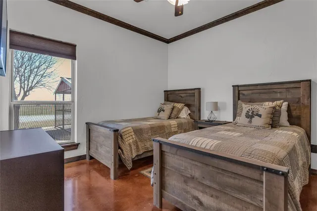 a bathroom with a granite countertop sink a toilet and a mirror
