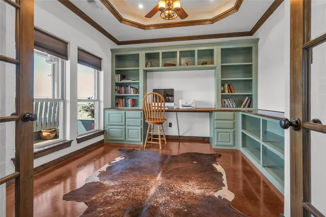 a room with furniture and a window