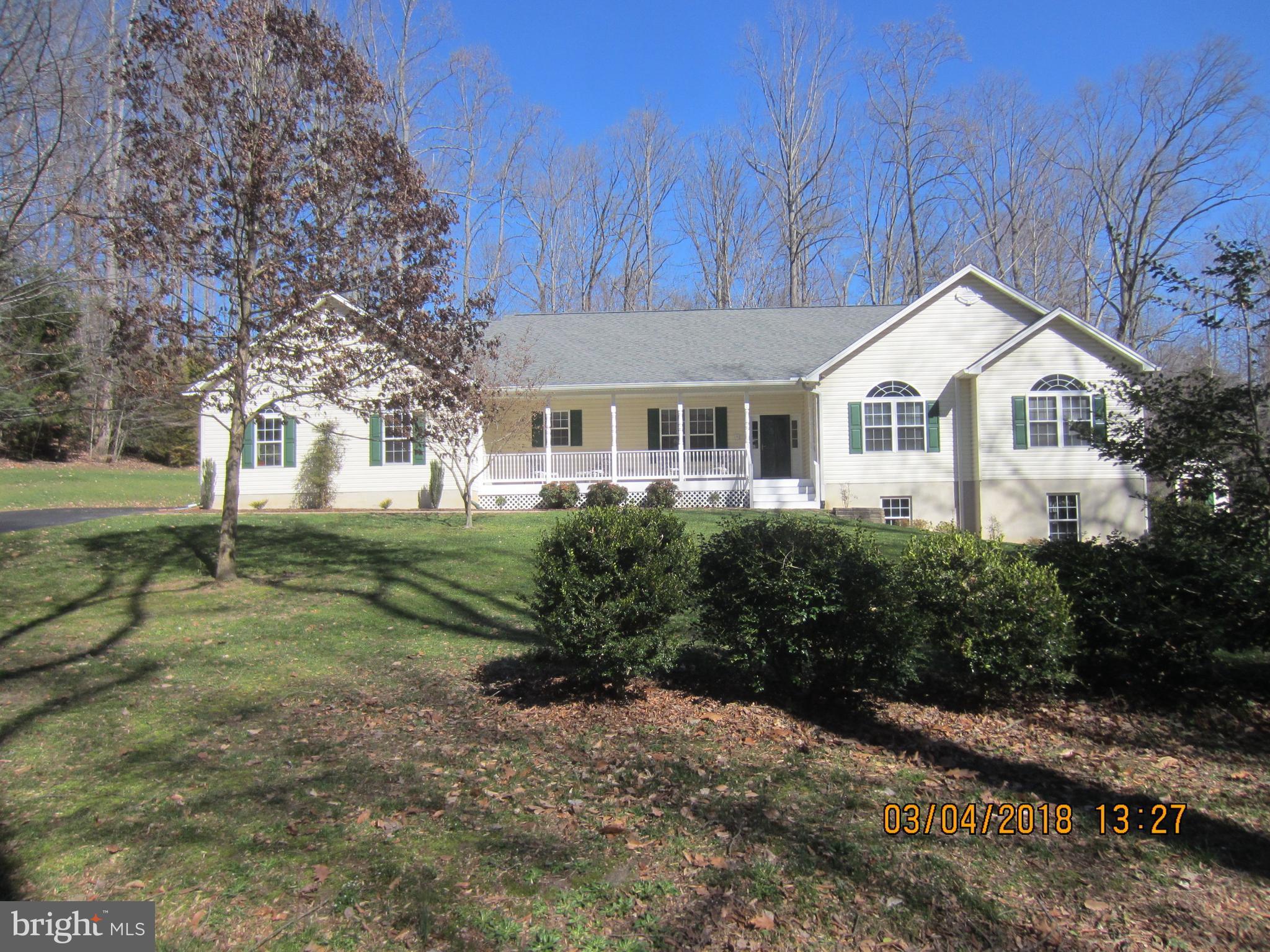 3535 Yellow Bank Road Dunkirk, MD 20754 - Photo 1 of 25 a front view of a house with garden