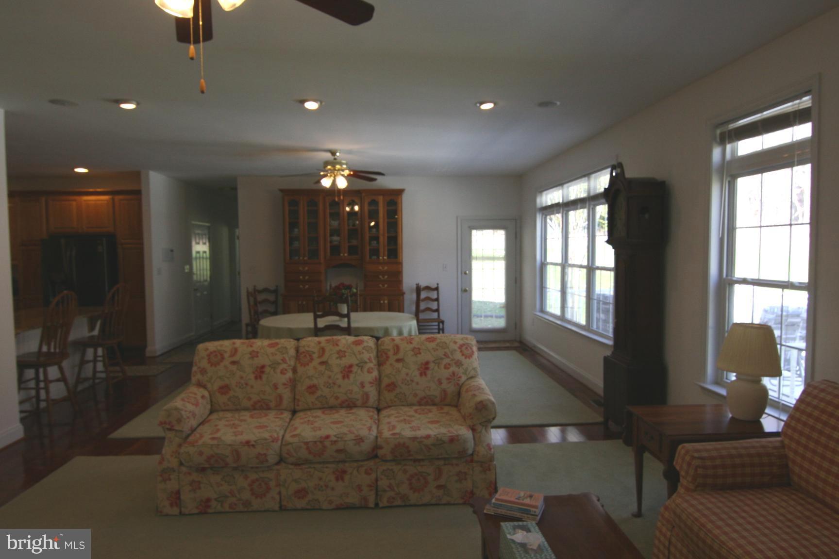 3535 Yellow Bank Road Dunkirk, MD 20754 - Photo 13 of 25 a living room with furniture and a chandelier