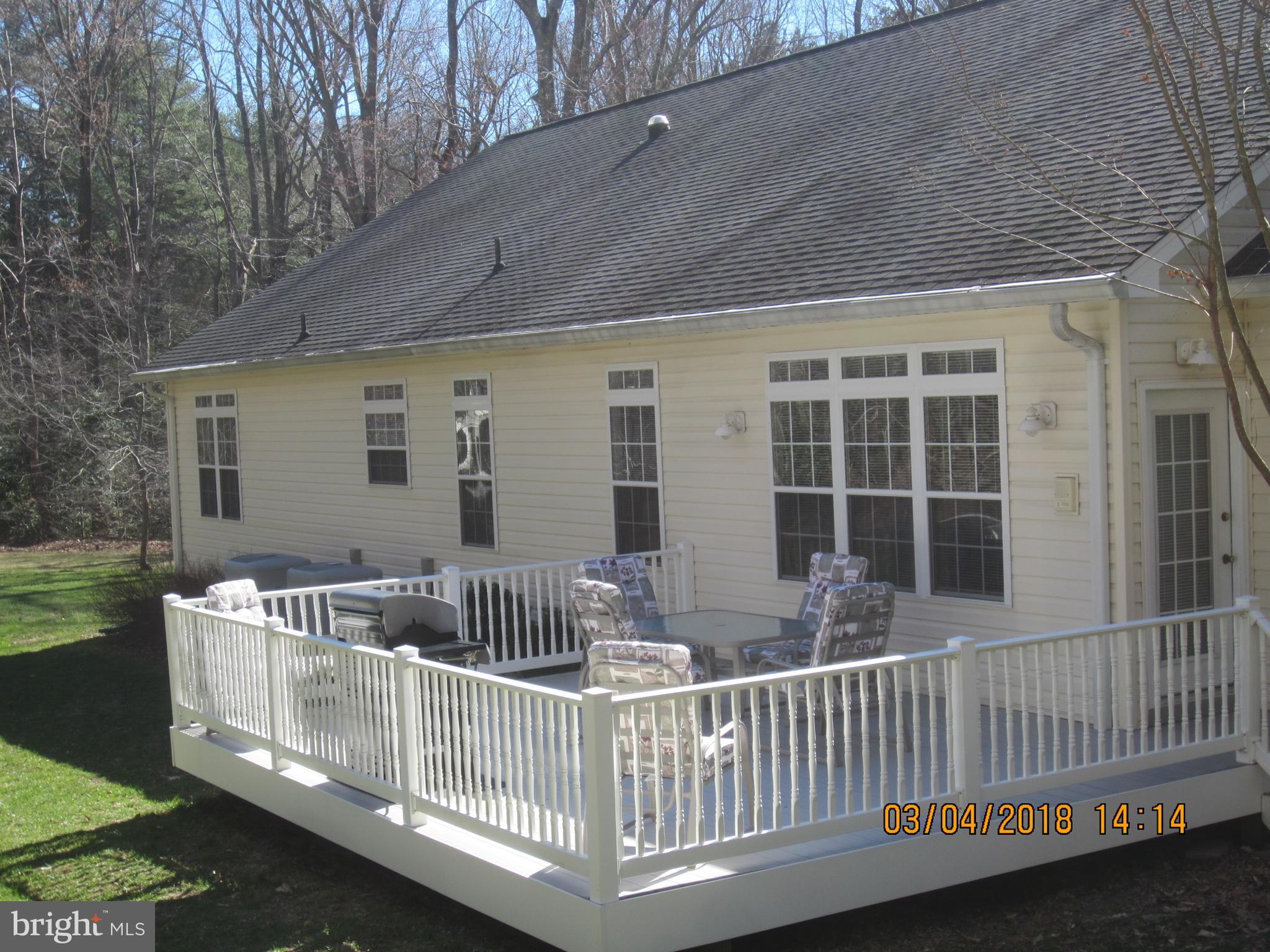 3535 Yellow Bank Road Dunkirk, MD 20754 - Photo 5 of 25 a view of a chair and table of the house