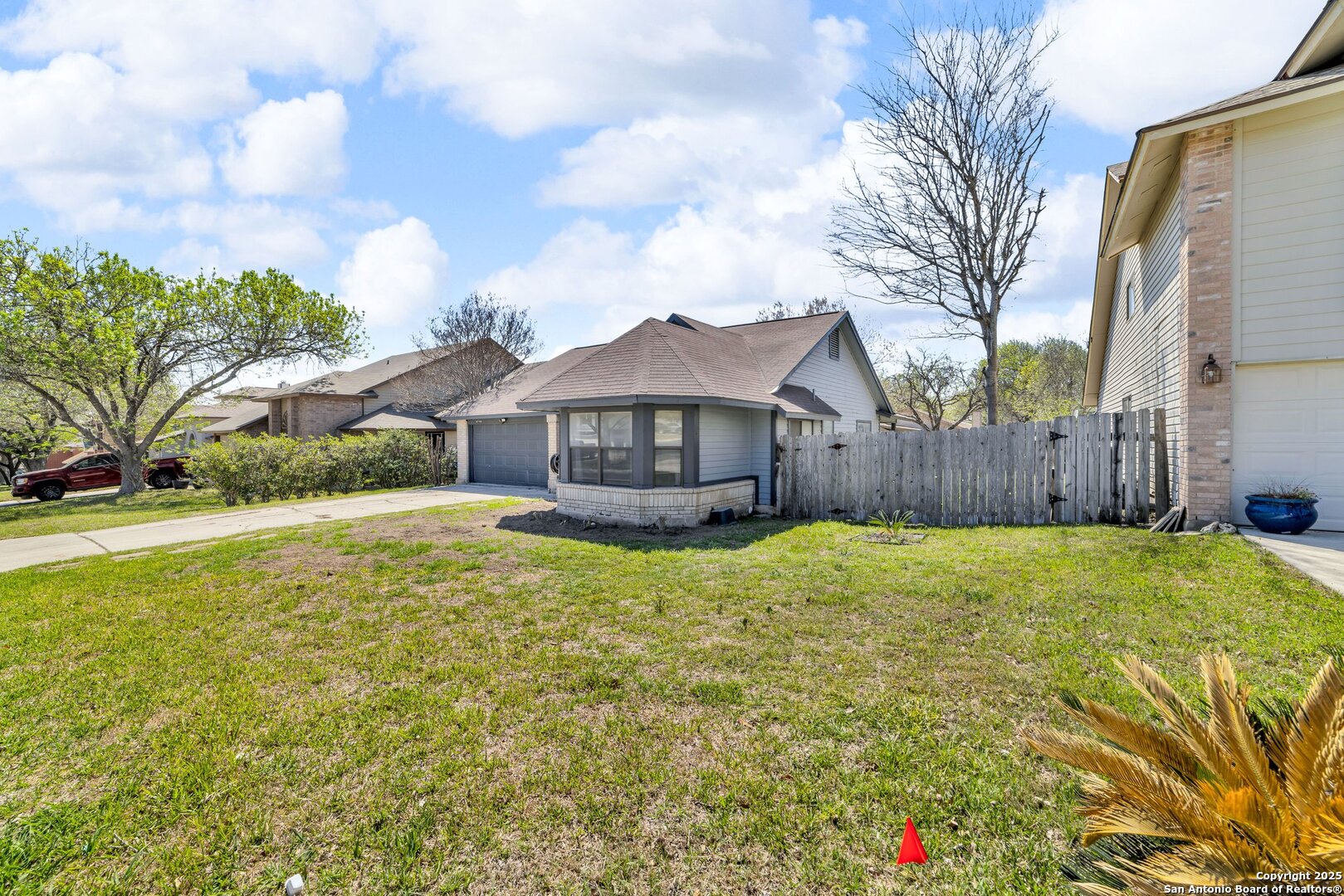 8746 Serene Ridge Drive San Antonio, TX 78239 - Photo 16 of 18 a house view with swimming pool in front of it