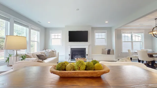 a bathroom with a sink a large mirror and a bathtub