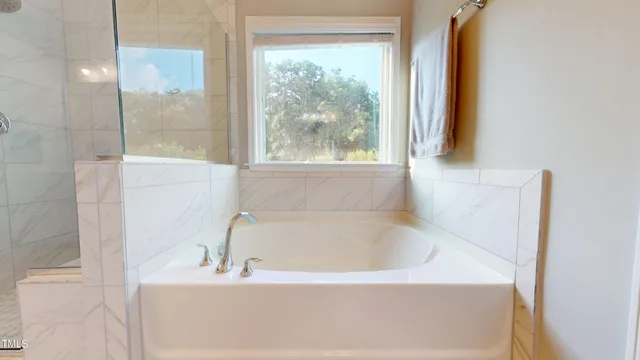 a view of pool with outdoor seating