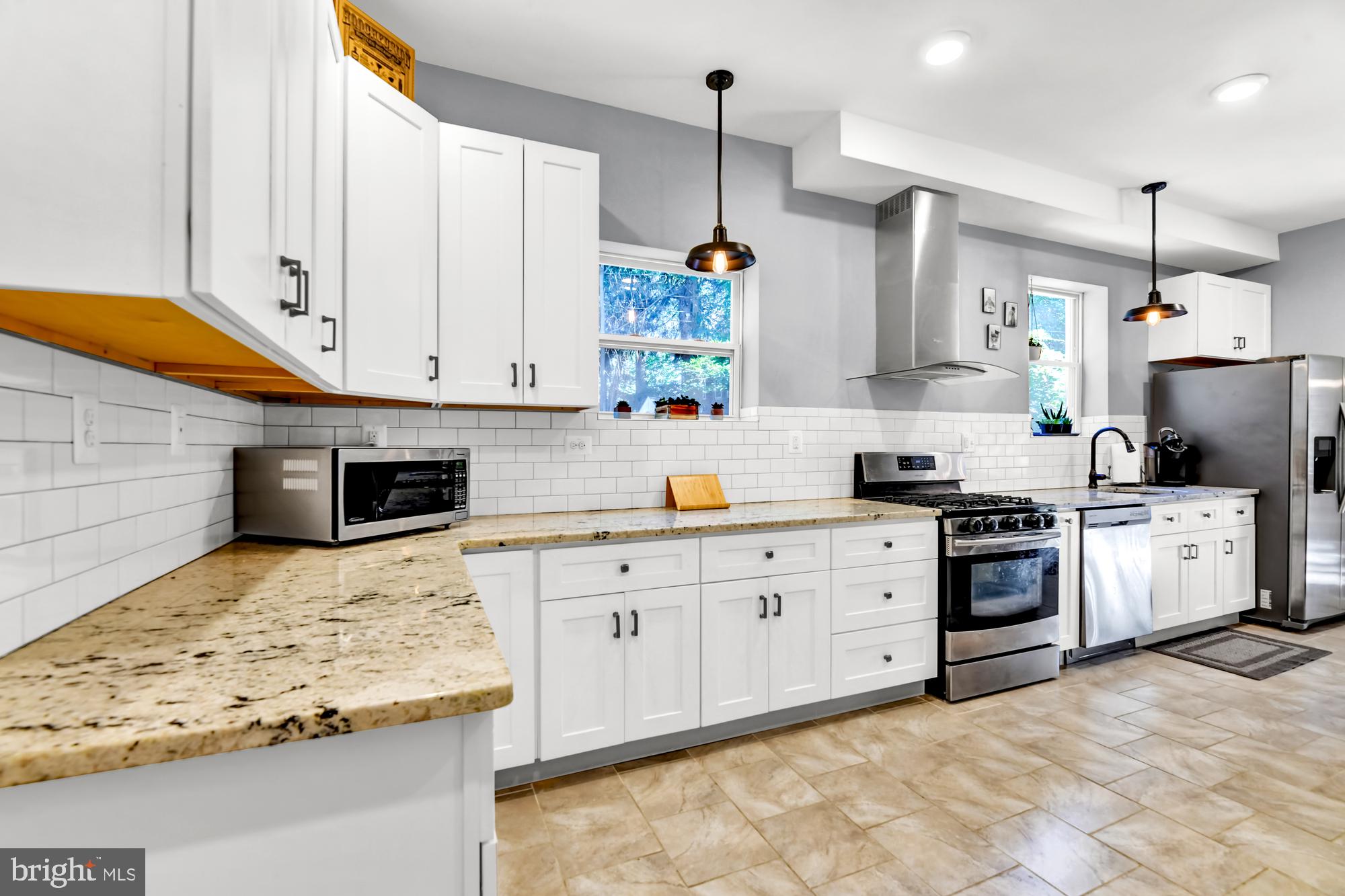 2607 Talbot Road Baltimore, MD 21216 - Photo 15 of 37 Counter top microwave conveys