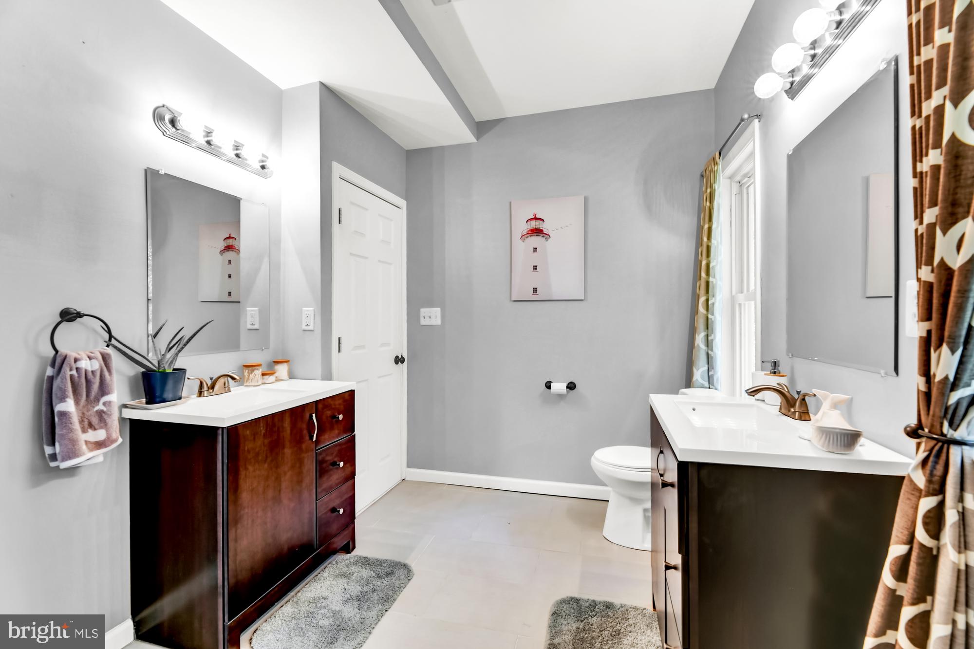 2607 Talbot Road Baltimore, MD 21216 - Photo 28 of 37 Hall Bath has two vanities