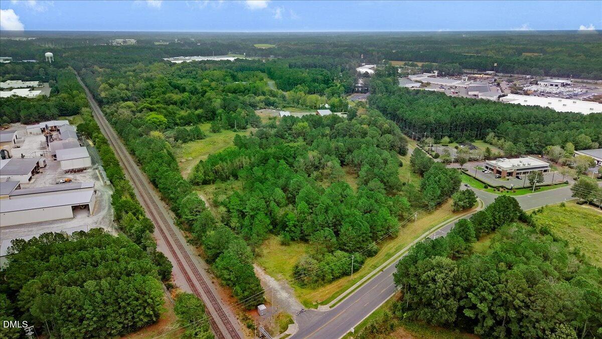175 East Peedin Road Smithfield, NC 27577 - Photo 3 of 5 an aerial view of multiple houses with yard