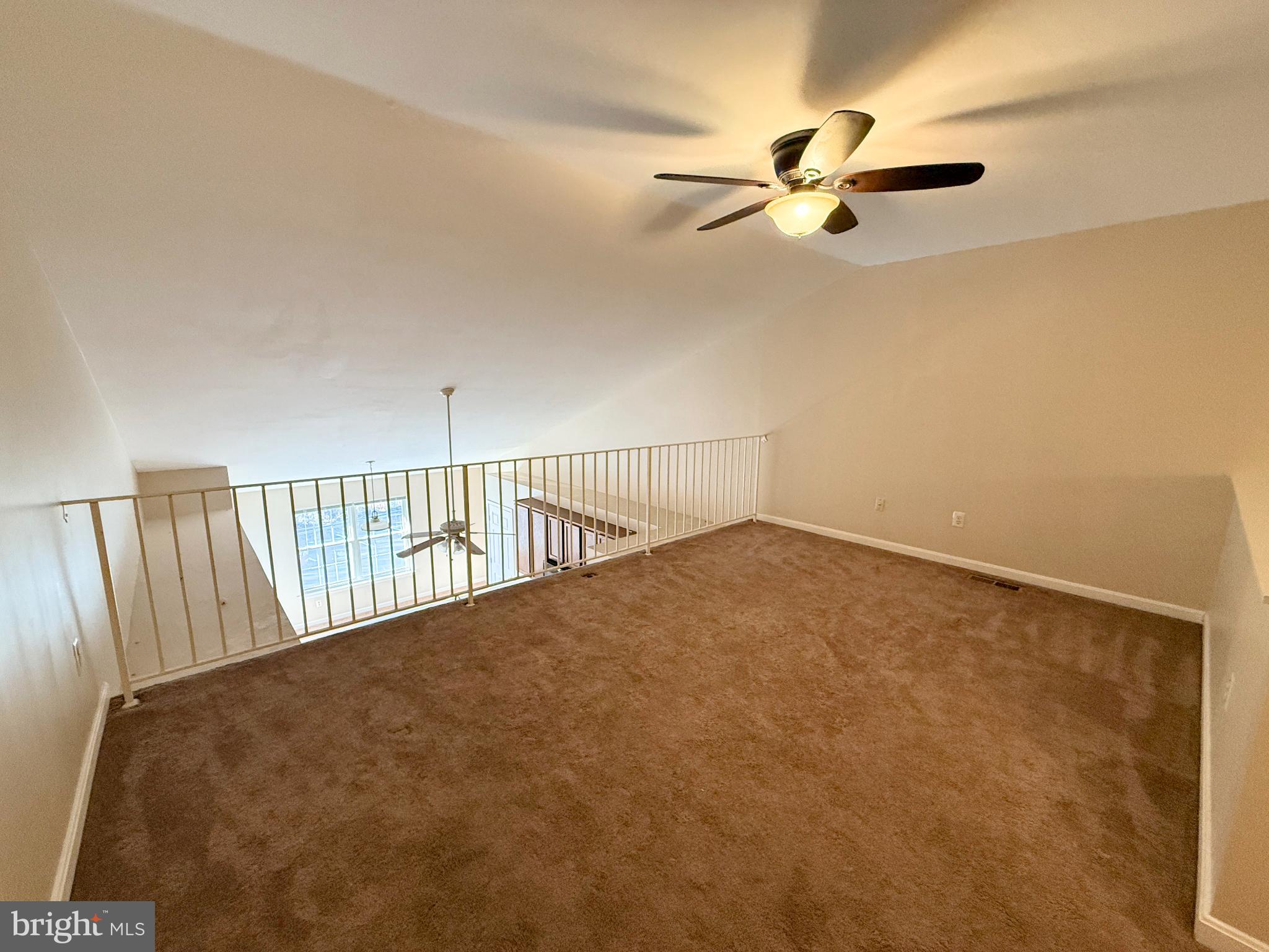 9211 Azure Court, Unit 202 Manassas, VA 20110 - Photo 12 of 16 a view of a hallway with a ceiling fan