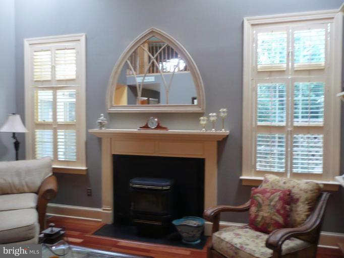 3205 Breckenridge Way Riva, MD 21140 - Photo 16 of 30 a living room with furniture fireplace and window