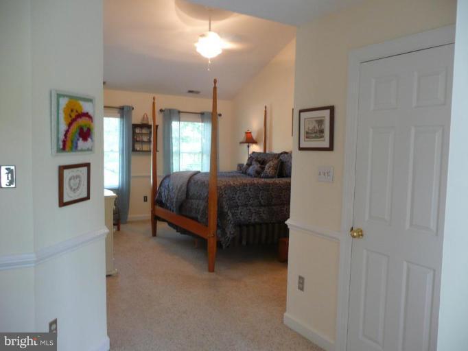 3205 Breckenridge Way Riva, MD 21140 - Photo 19 of 30 a bedroom with a bed and a cabinets