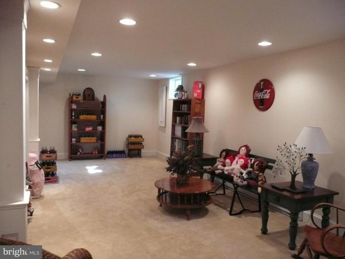3205 Breckenridge Way Riva, MD 21140 - Photo 25 of 30 a living room with furniture and a wooden floor