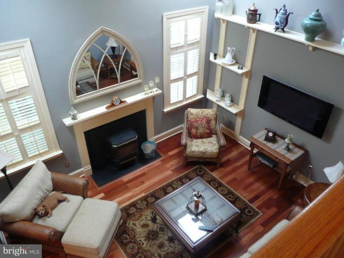 3205 Breckenridge Way Riva, MD 21140 - Photo 10 of 30 a living room with furniture fireplace and flat screen tv