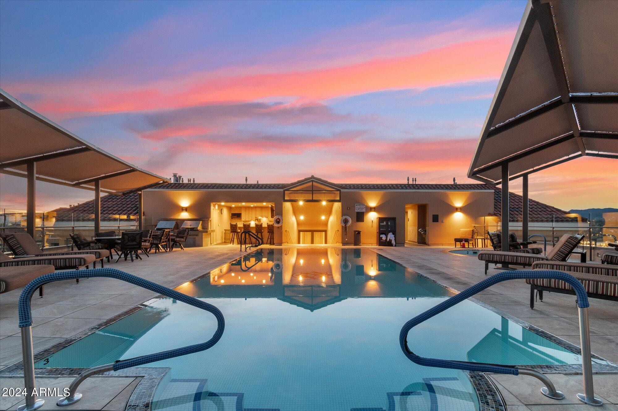 7181 East Camelback Road, Unit 206 Scottsdale, AZ 85251 - Photo 20 of 28 a view of a patio with swimming pool