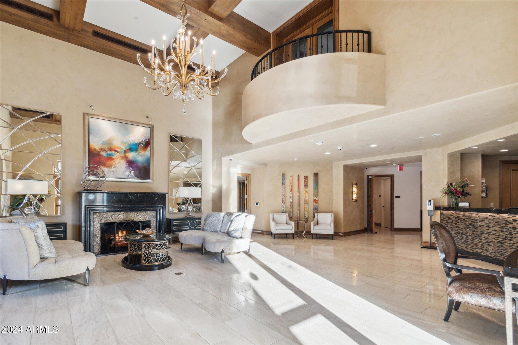 7181 East Camelback Road, Unit 206 Scottsdale, AZ 85251 - Photo 26 of 28 a living room with furniture and a fireplace