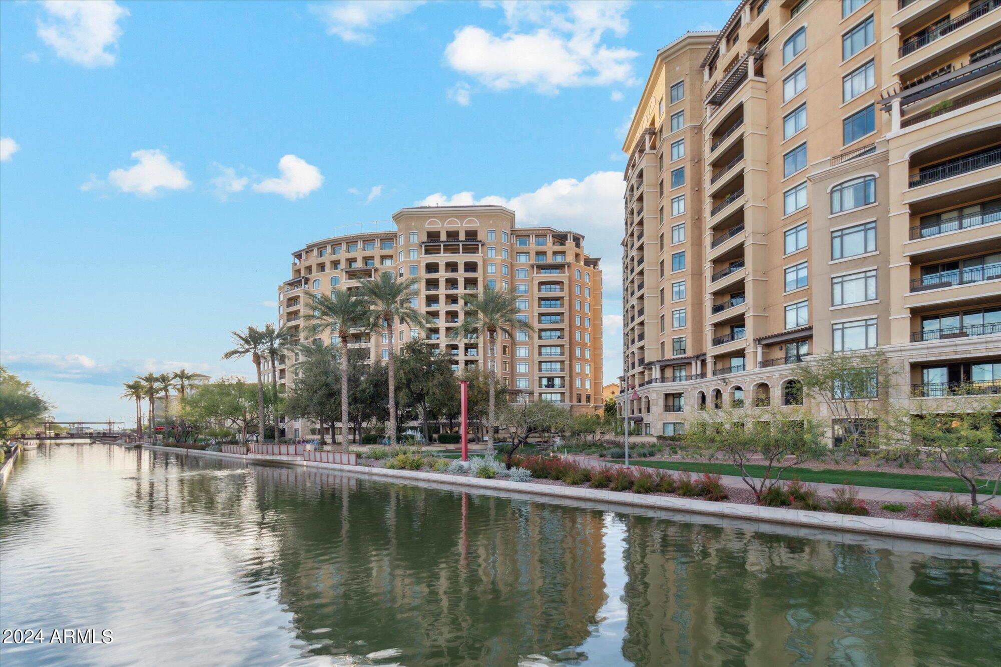 7181 East Camelback Road, Unit 206 Scottsdale, AZ 85251 - Photo 3 of 28 a view of water with a tall building