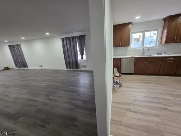 a large bathroom with a large window