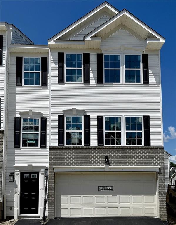 a front view of a house with windows