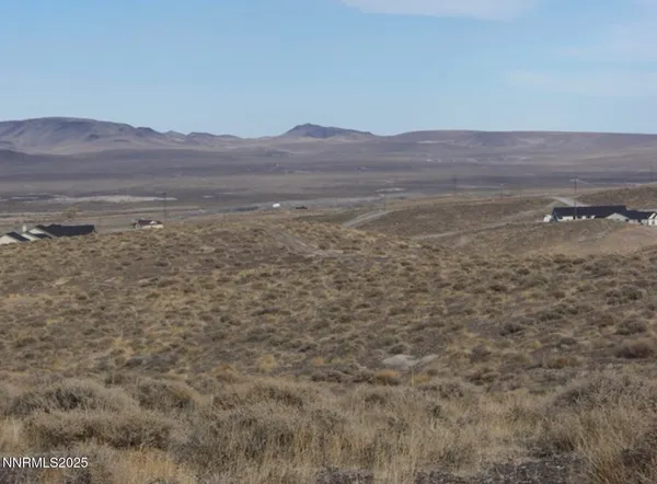 a view of ocean with mountains