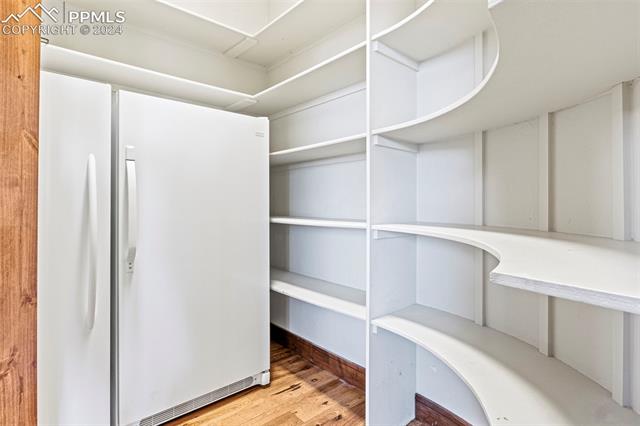 7115 Wildridge Road Colorado Springs, CO 80908 - Photo 24 of 49 Walk in pantry with 2 standalone freezers