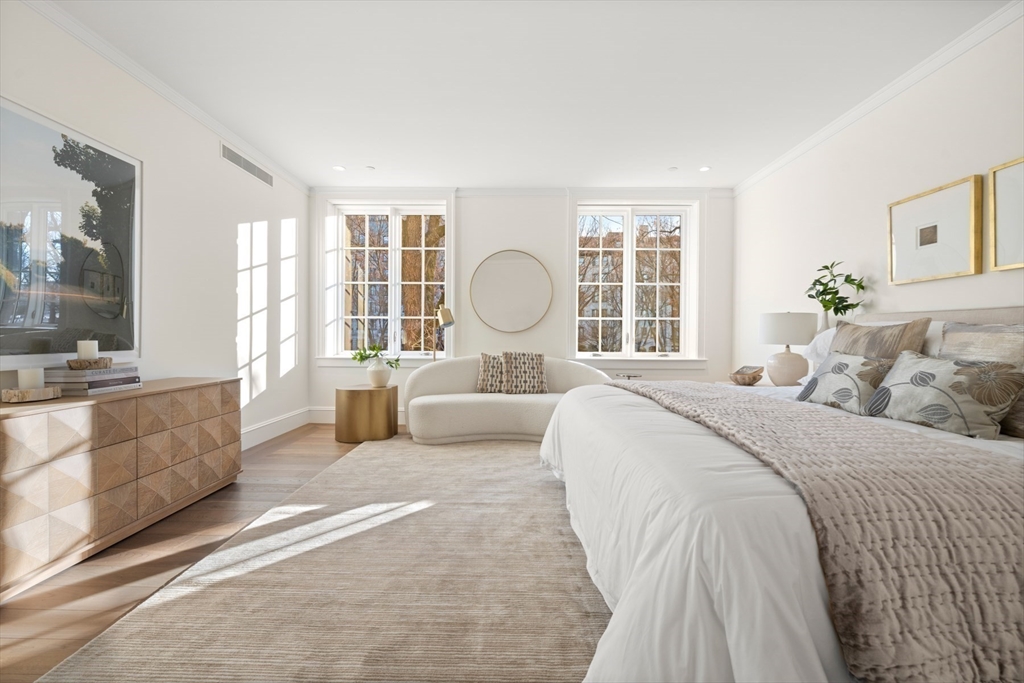 397 Commonwealth Avenue, Unit 2 Boston, MA 02215 - Photo 15 of 23 a bedroom with a large bed and a large window