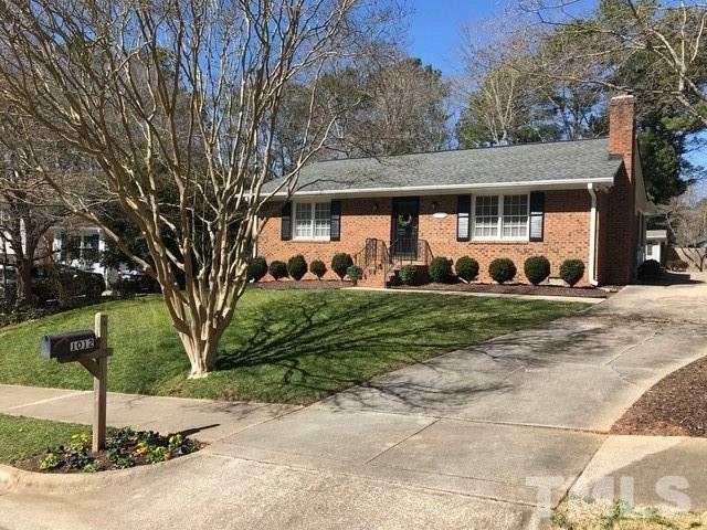 1012 Mockingbird Drive Raleigh, NC 27615 - Photo 1 of 26 a front view of a house with a yard