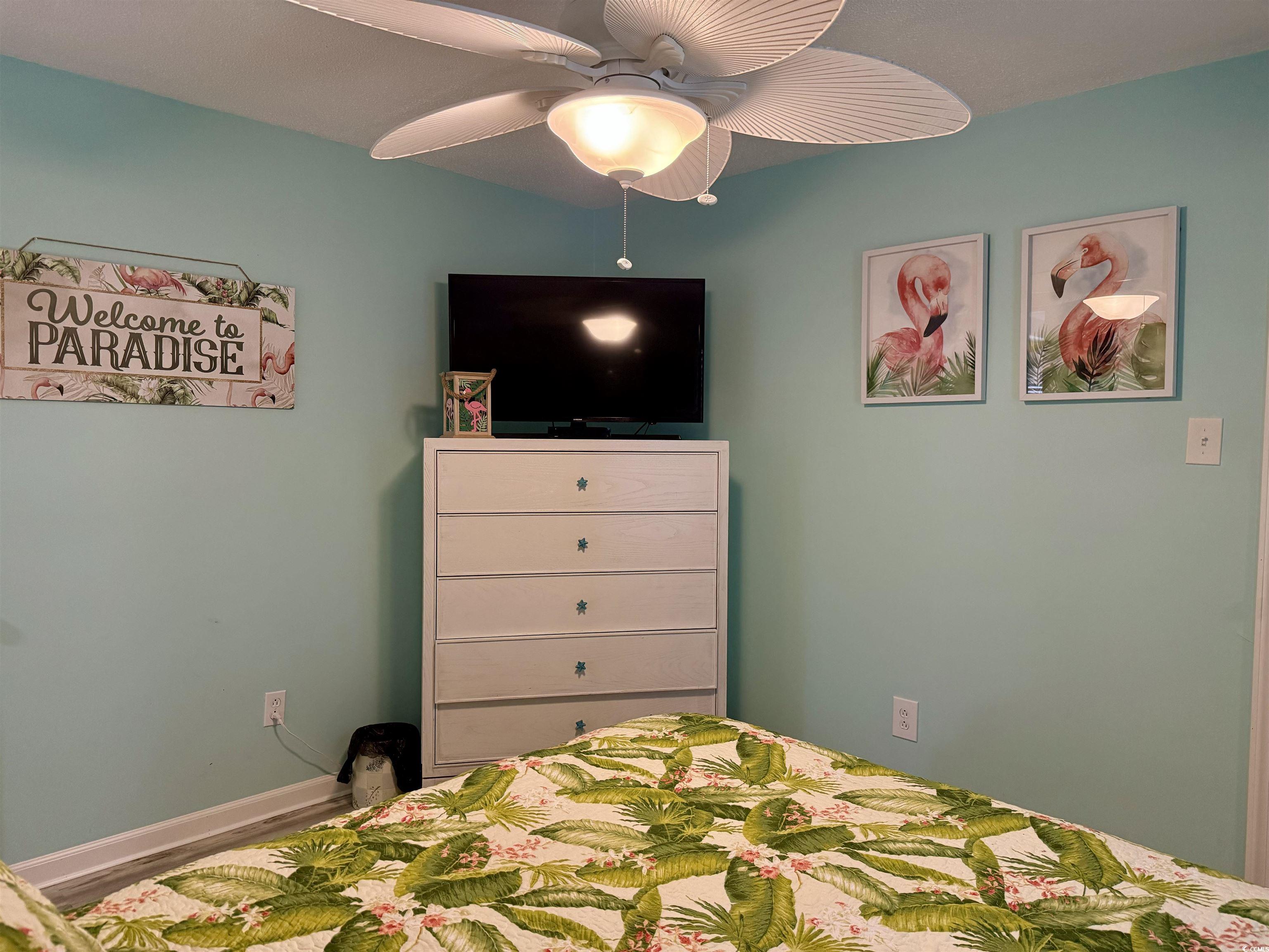 523 Sandpebble Surfside Beach, SC 29575 - Photo 17 of 31 Bedroom featuring ceiling fan and hardwood / wood-