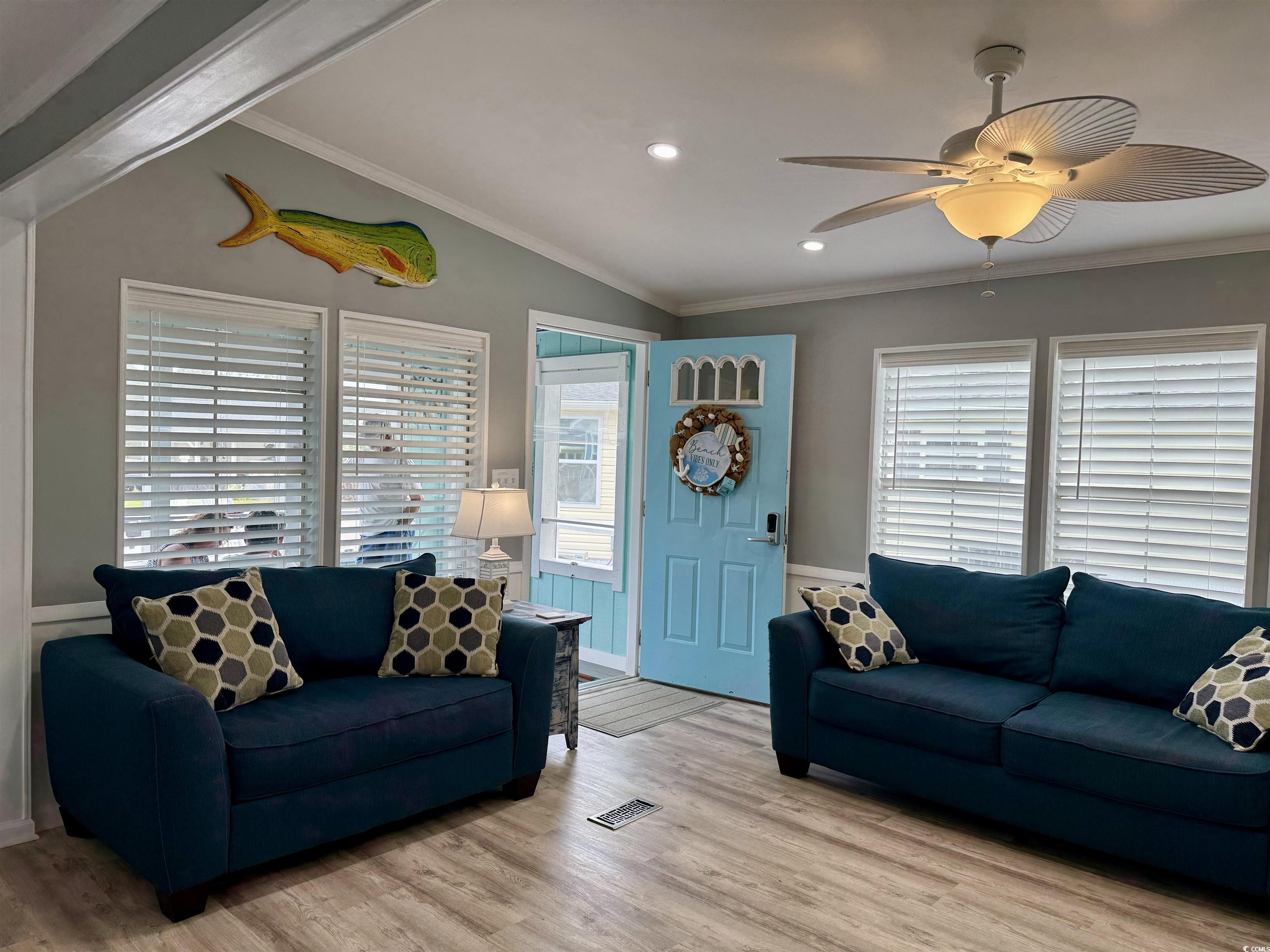 523 Sandpebble Surfside Beach, SC 29575 - Photo 19 of 31 Living room featuring ornamental molding, lofted c