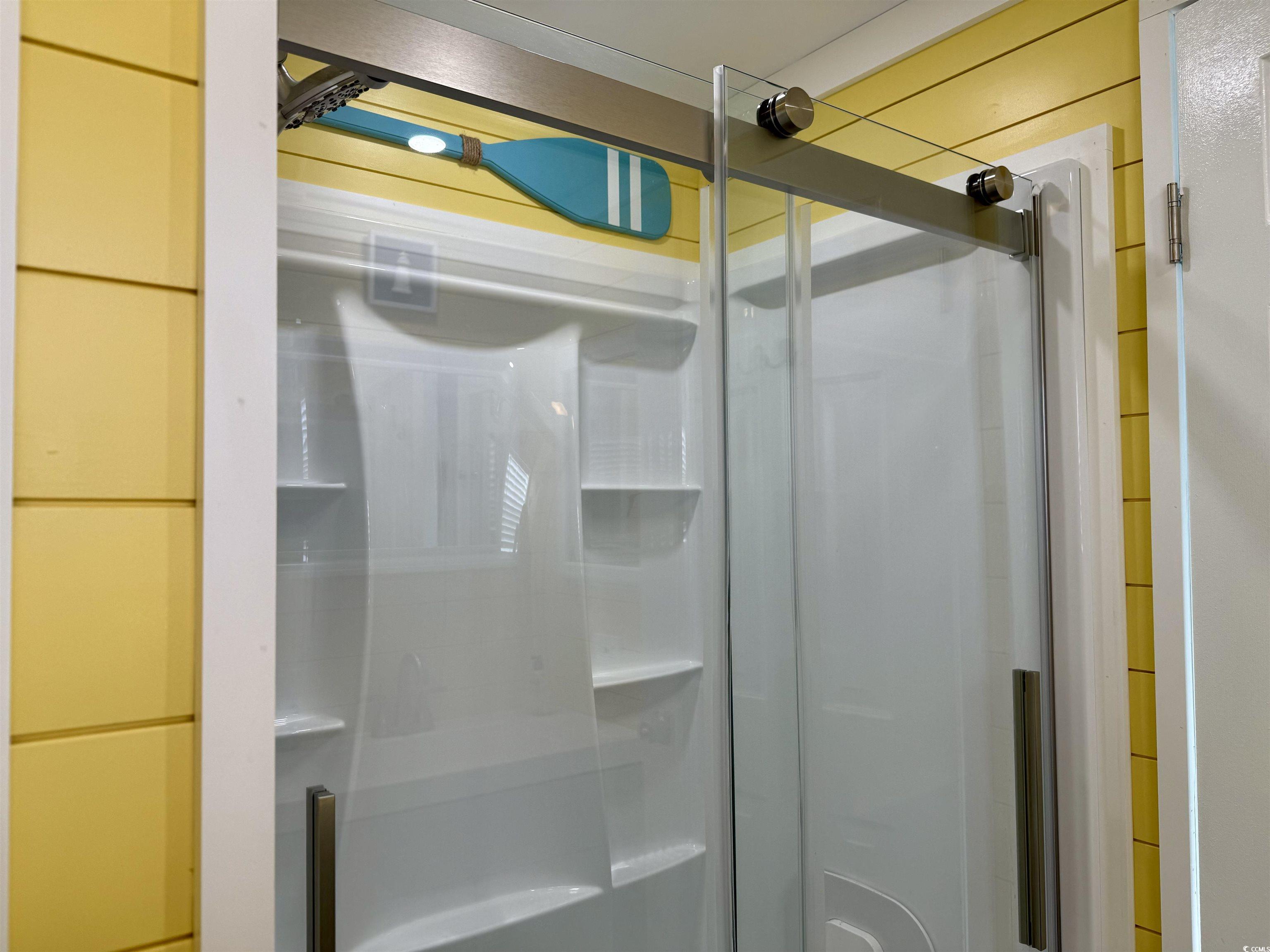 523 Sandpebble Surfside Beach, SC 29575 - Photo 22 of 31 Bathroom featuring a shower with shower door