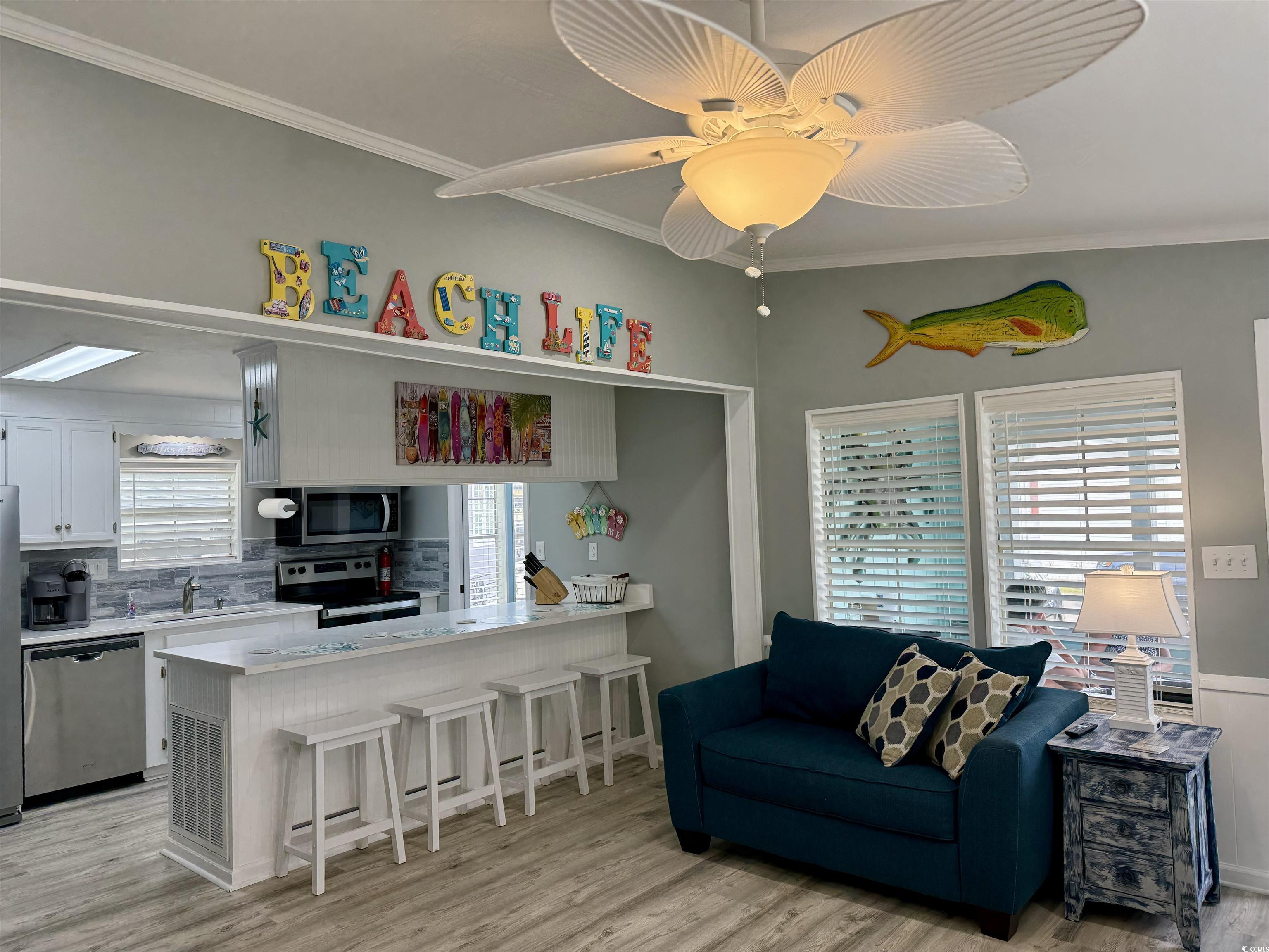 523 Sandpebble Surfside Beach, SC 29575 - Photo 26 of 31 Kitchen featuring light wood-type flooring, kitche