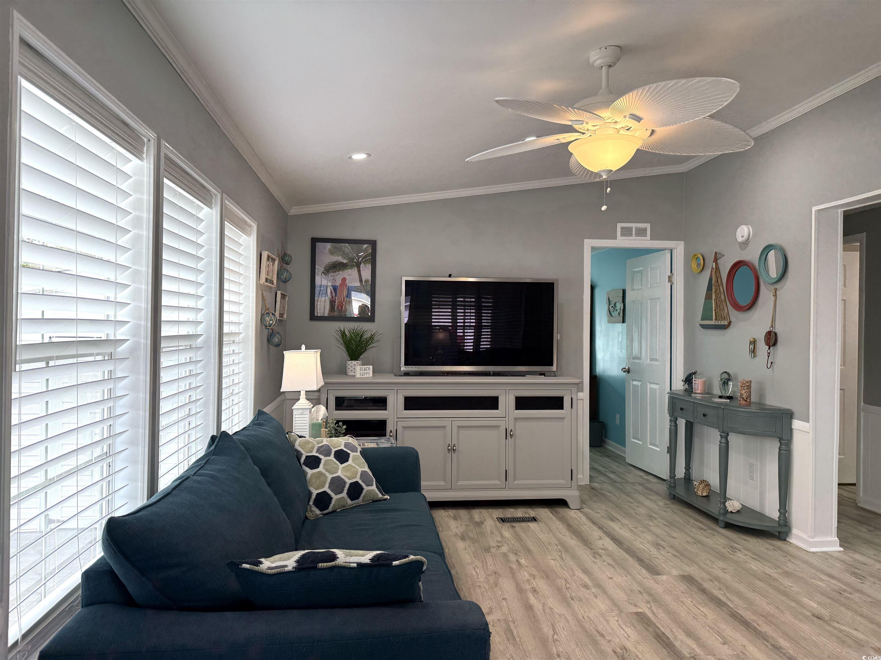523 Sandpebble Surfside Beach, SC 29575 - Photo 4 of 31 Living room featuring ceiling fan, vaulted ceiling