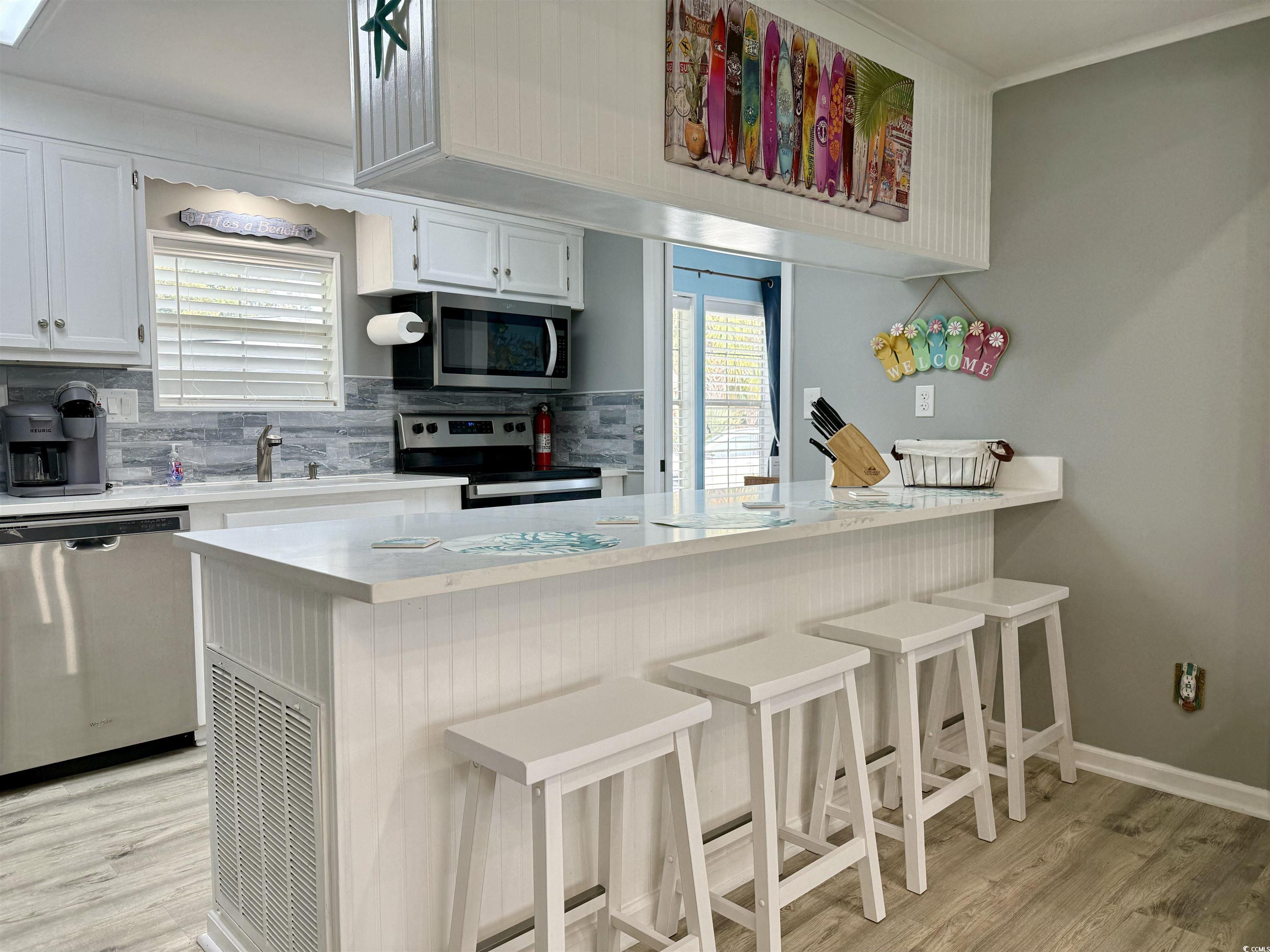 523 Sandpebble Surfside Beach, SC 29575 - Photo 6 of 31 Kitchen featuring stainless steel appliances, whit