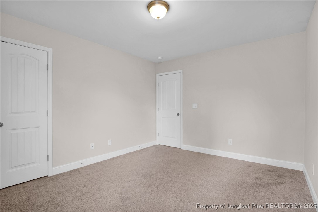 136 Loch Lane Cameron, NC 28326 - Photo 24 of 49 a view of an empty room
