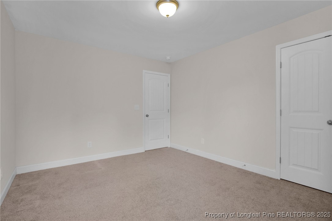 136 Loch Lane Cameron, NC 28326 - Photo 27 of 49 a view of an empty room