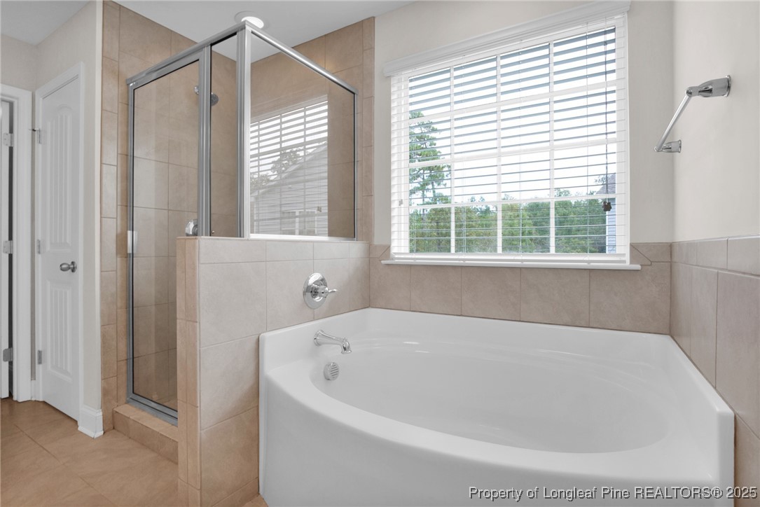 136 Loch Lane Cameron, NC 28326 - Photo 31 of 49 a white bath tub sitting next to a window