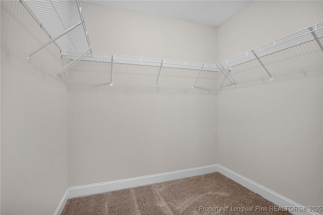 136 Loch Lane Cameron, NC 28326 - Photo 33 of 49 a view of a room with racks on the wall