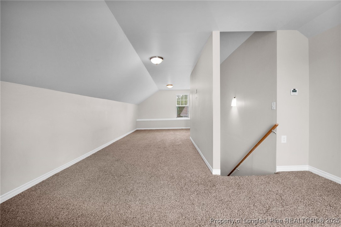 136 Loch Lane Cameron, NC 28326 - Photo 35 of 49 an empty room with windows and entrance