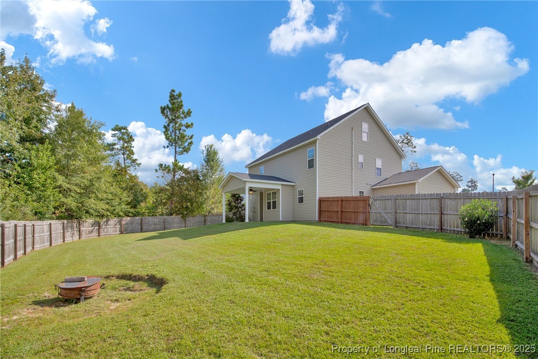 136 Loch Lane Cameron, NC 28326 - Photo 49 of 49 a view of a house with a yard