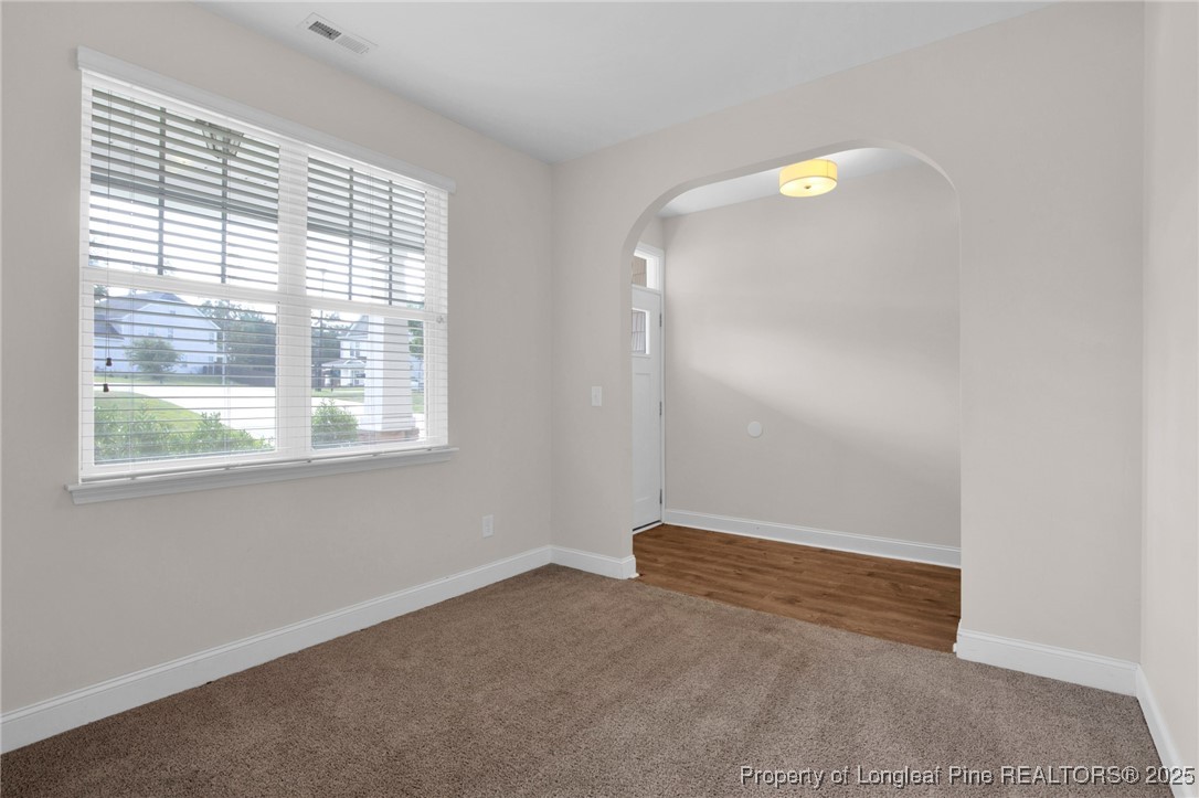 136 Loch Lane Cameron, NC 28326 - Photo 7 of 49 an empty room with a window