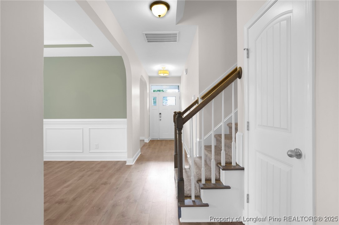 136 Loch Lane Cameron, NC 28326 - Photo 8 of 49 a view of front door with stairs