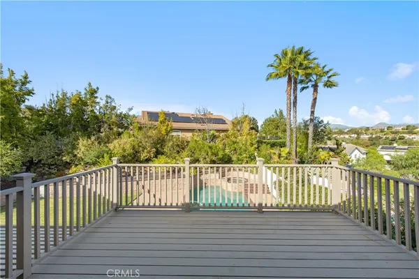 a view of a garden from a balcony