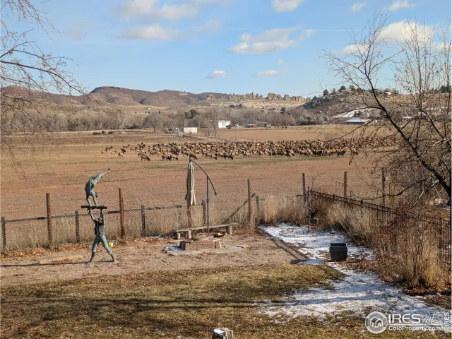 a view of an ocean and city