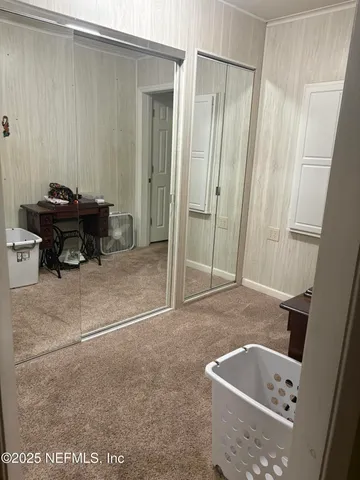 a bath tub sitting in a bathroom next to a tub