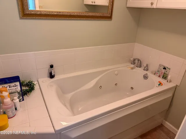 a bathroom with a bathtub