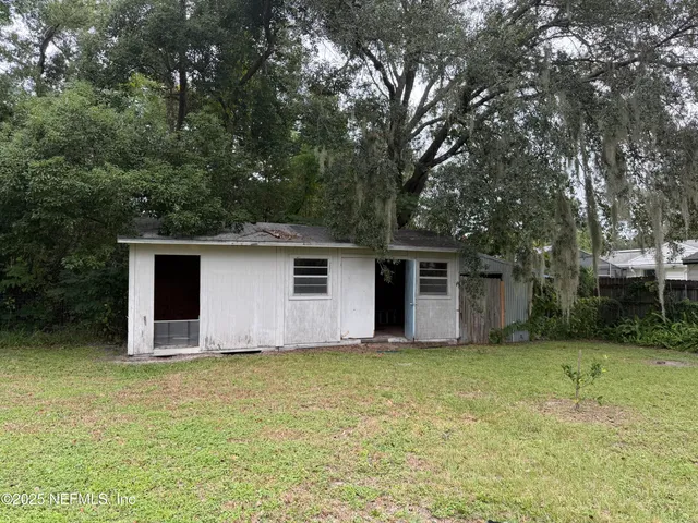 a view of a lake with a house