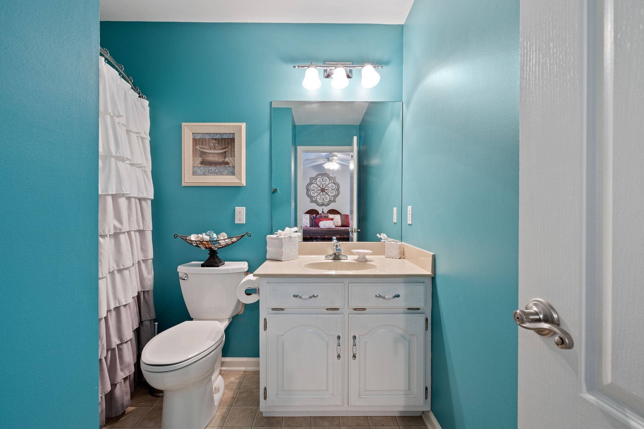 56 Cunningham Hollow Road Fayetteville, TN 37334 - Photo 34 of 54 a bathroom with a toilet sink and mirror