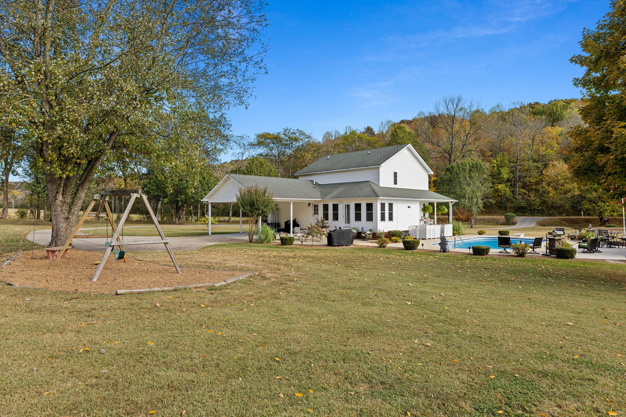 56 Cunningham Hollow Road Fayetteville, TN 37334 - Photo 39 of 54 a front view of a house with garden
