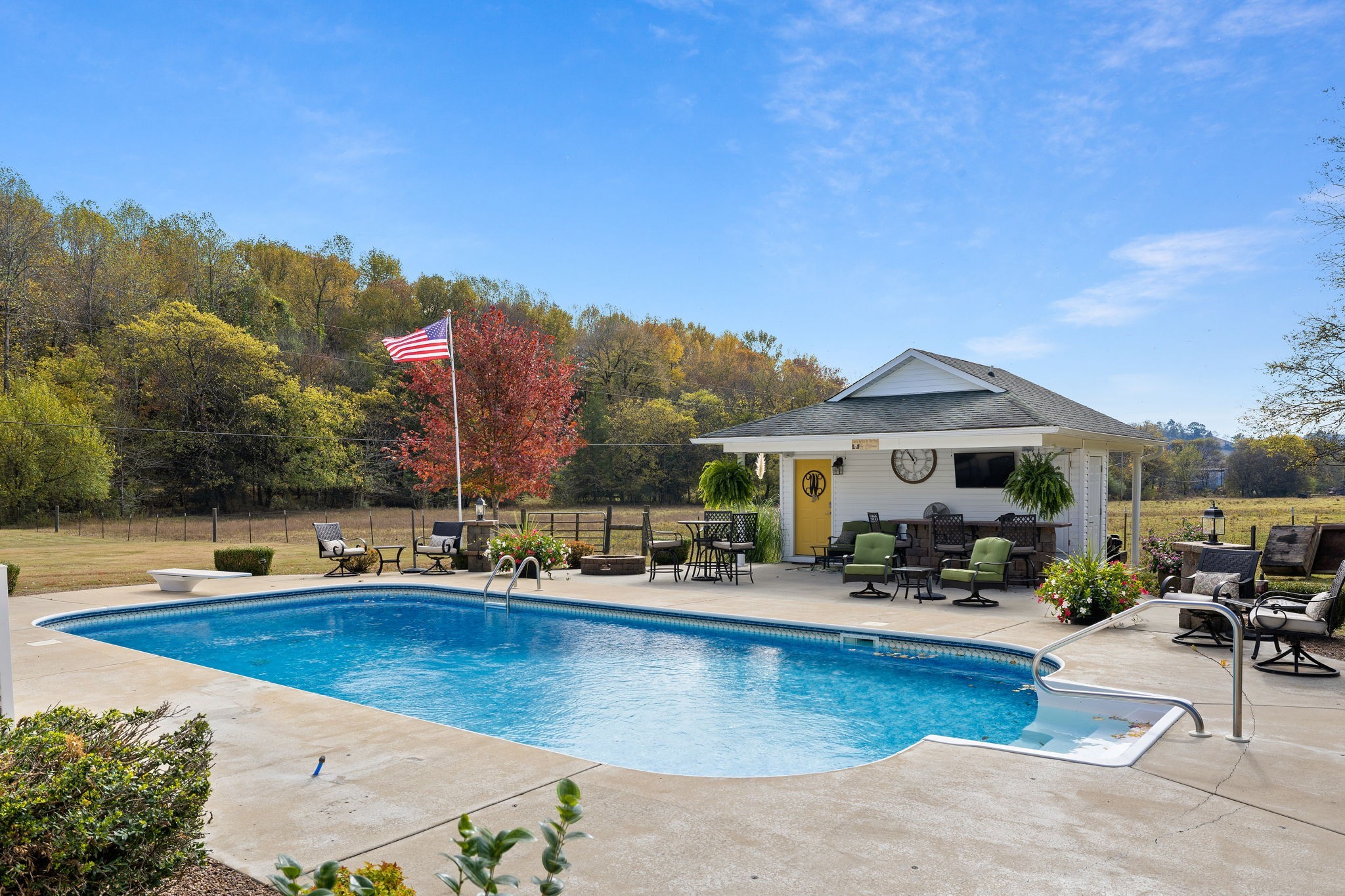 56 Cunningham Hollow Road Fayetteville, TN 37334 - Photo 41 of 54 a view of a swimming pool with chairs and plants